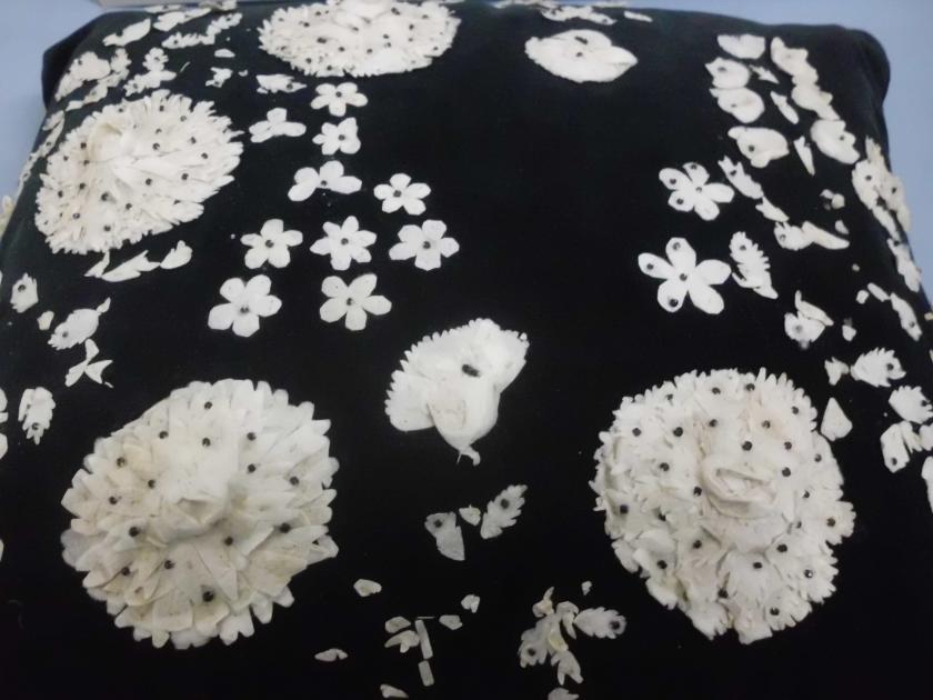 Sofakissen mit Applikationen